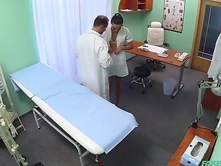 Suntanned Nurse Gets More Then A Rubdown From The Physician